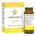 A bottle and box of Omniflora N Darmspezifisches Probiotikum, showing the product packaging and container on a plain white background.