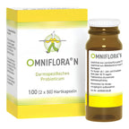 A bottle and box of Omniflora N Darmspezifisches Probiotikum, showing the product packaging and container on a plain white background.