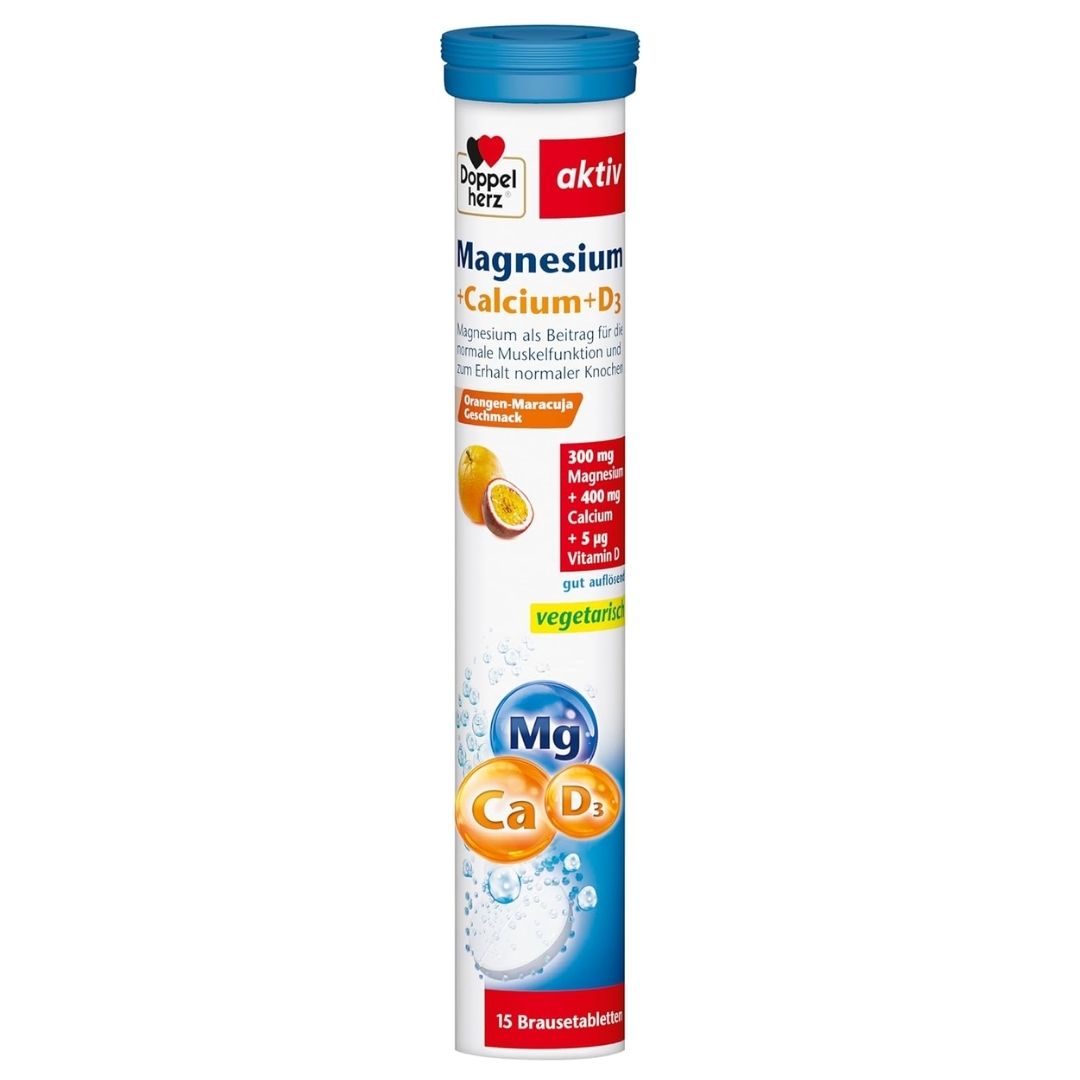 Supplement tube with magnesium, calcium, and vitamin D on a white background