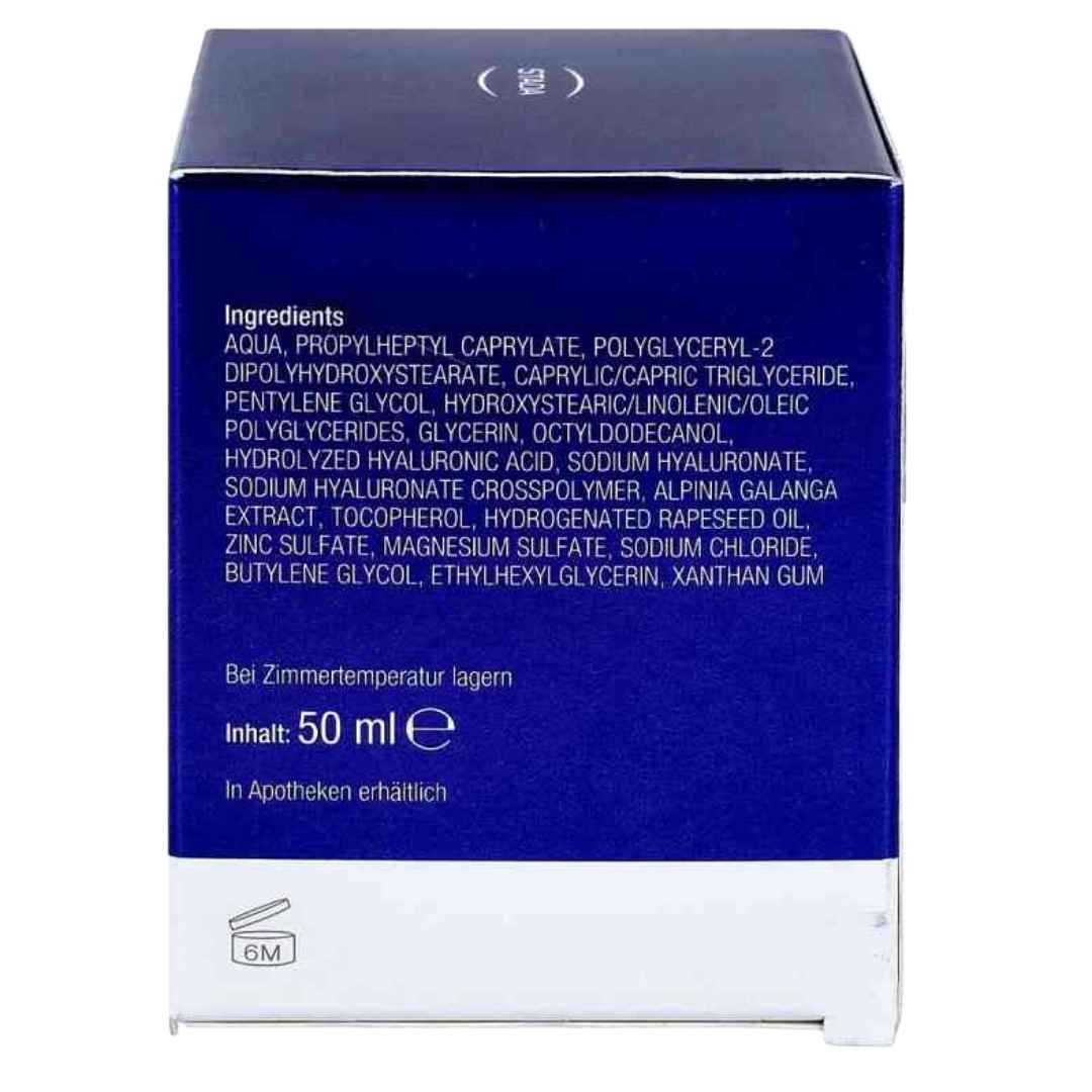 Blue box with white text containing product ingredients and volume on a white background