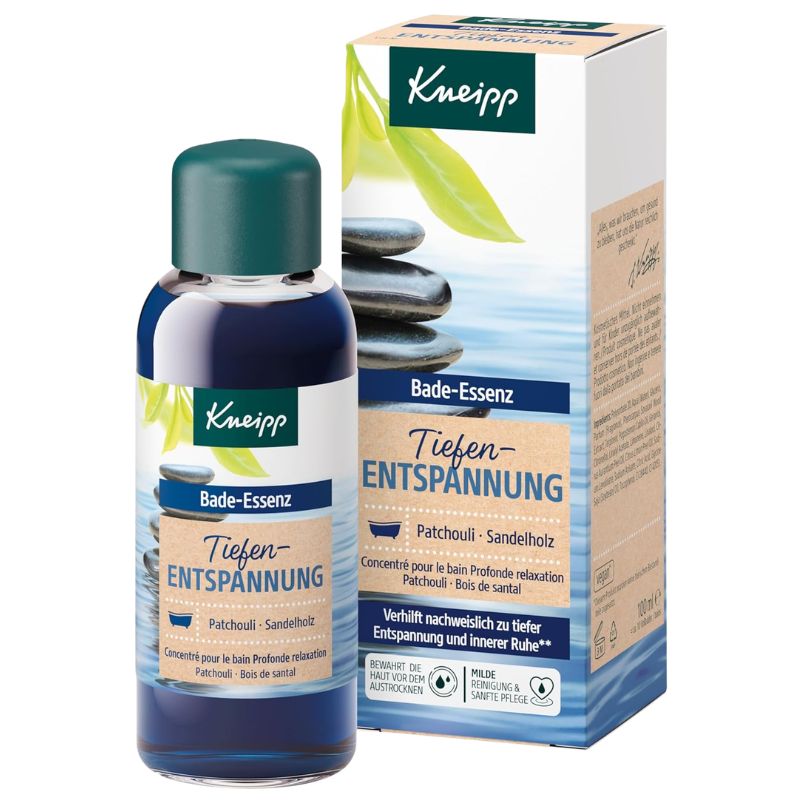 A bottle and box of Kneipp Bade-Essenz Tiefen-Entspannung patchouli and sandalwood bath relaxation liquid on a white background.