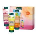 Kneipp facial care gift set featuring three tubes of facial lotions and a matching gift box with a pink and orange watercolor design.