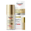 Eucerin Hyaluron-Filler + Elasticity 3D Serum shown as a clear bottle with a gold cap next to its white and gold retail box on a white background.