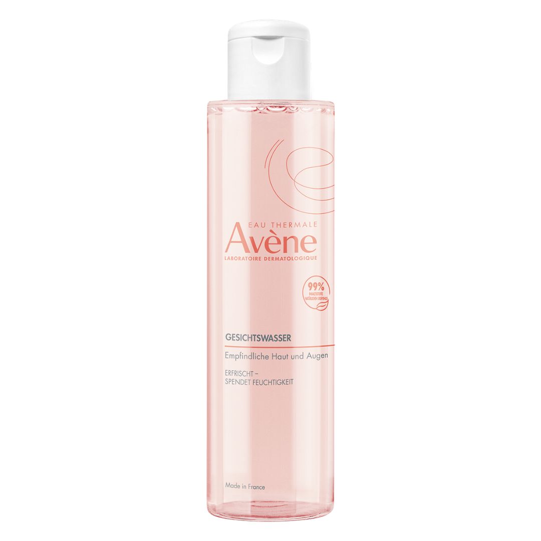 Avene facial water bottle on a white background