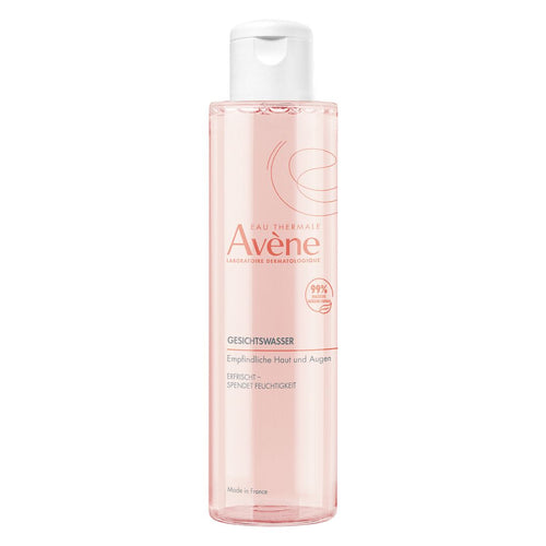 Avene facial water bottle on a white background