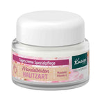 A jar of Kneipp Tagescreme Spezialpflege hand cream with a white lid and a pink and green label, set against a plain white background.
