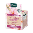 Kneipp Mandelblüten Hautzart face cream packaging box with pink cherry blossom graphics, beige background panels, and green Kneipp branding on a white background.