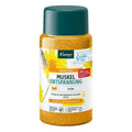 A bottle of Knopp Muskel Entspannung mineral salts, featuring a dark teal cap, a white label with yellow daisy graphics, and visible golden-orange mineral powder inside. The product is photographed on a clean white background.