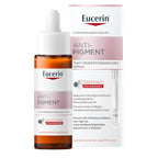 Eucerin Anti-Pigment serum shown as an amber glass dropper bottle next to its white and pink packaging box, featuring the Thiamidol technology.
