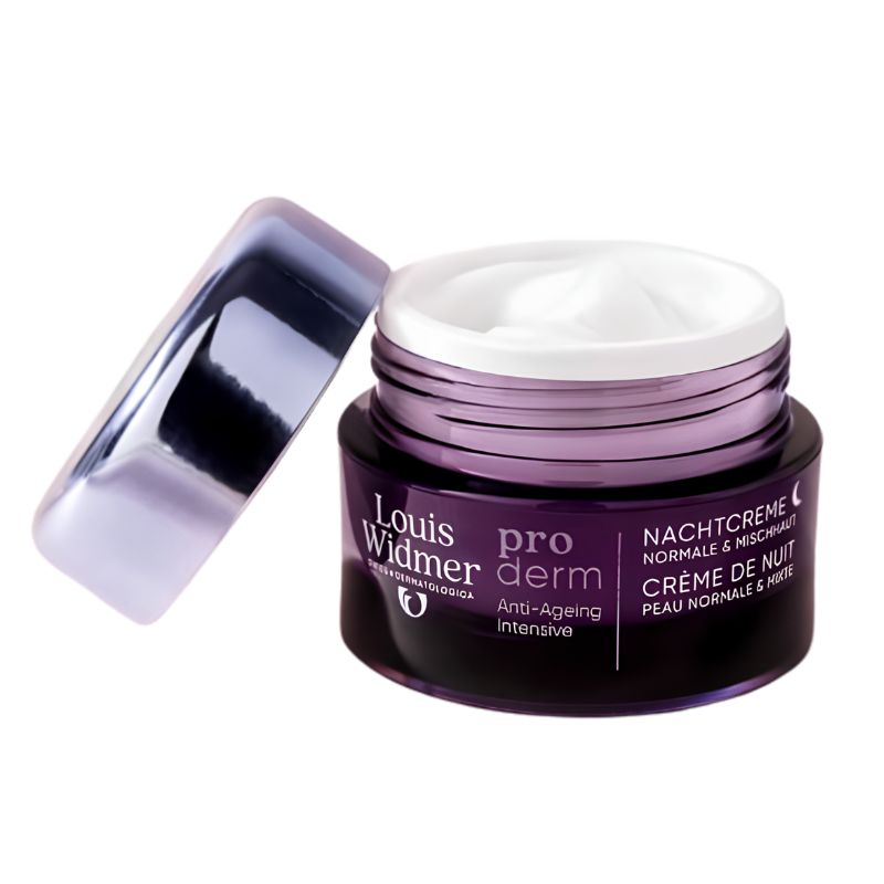 Louis Widmer pro derm anti-ageing night cream in a dark purple jar with a white cream visible inside, shown with its metallic purple lid leaning against it on a white background.