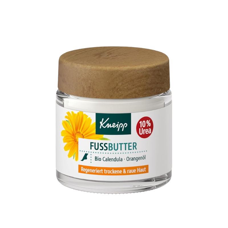 A jar of Kneipp Fussbutter foot butter with a natural wood lid and a white label featuring a yellow dandelion and green logo, set against a plain white background.