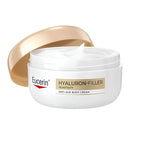 Eucerin Hyaluron-Filler +Elasticity Anti-Age Body Cream in a white jar with a metallic gold lid resting behind it, on a clean white background.