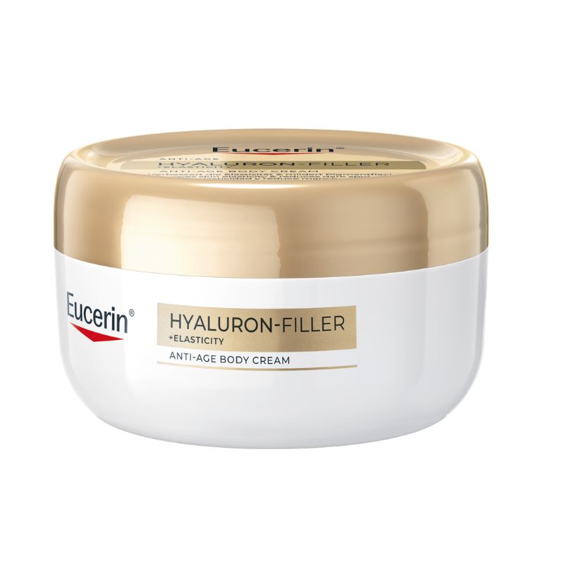 Eucerin Hyaluron-Filler + Elasticity Anti-Age Body Cream in a white jar with a metallic gold lid, on a white background.