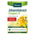 Front of a Kneipp Johanniskraut Dragées H herbal supplement box, featuring yellow flowers, green and dark blue text, and a white background.