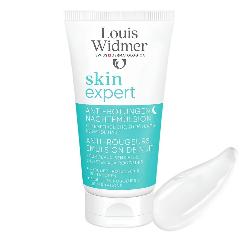 A white squeeze tube of Louis Widmer Skin Expert night cream with a turquoise band, shown on a white background with a clear gel smear to the right.