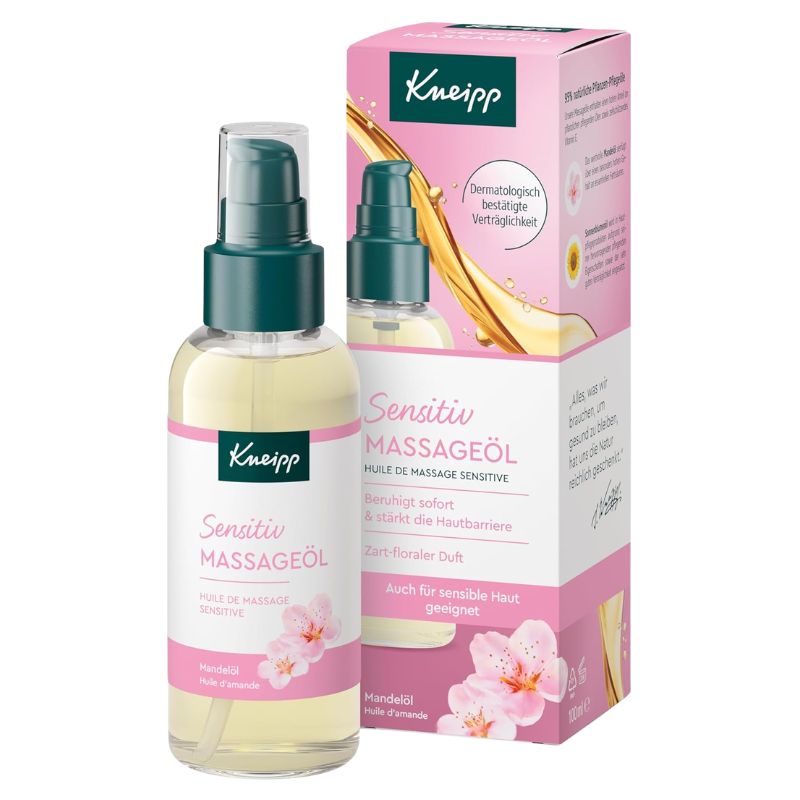 Kneipp Sensitiv Massageöl sensitive massage oil shown as a clear spray bottle with a dark green pump and a pink-and-white box behind it on a white background.