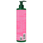 The back view of a tall cylindrical pump bottle with a dark green pump and cap, featuring a bright pink label with white text, barcode, and QR code, on a plain white background.