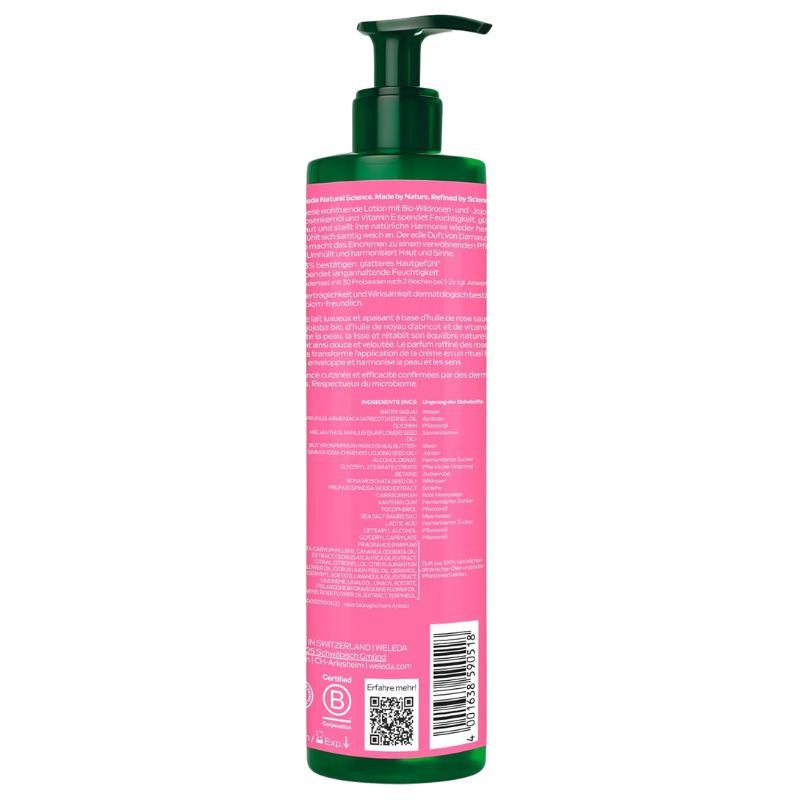 The back view of a tall cylindrical pump bottle with a dark green pump and cap, featuring a bright pink label with white text, barcode, and QR code, on a plain white background.