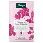 Kneipp Hautzartes Creme-Öl Peeling facial sheet mask in a pink foil packet with magenta floral graphics and a white text panel.