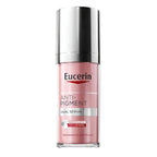 Eucerin Anti-Pigment Dual Serum in a clear glass bottle with a pink liquid and a reflective silver cap, shown on a plain white background.