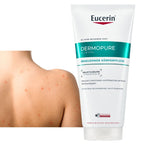 A tube of Eucerin Dermopure Clinical Eczema Relief body care cream stands against a white background, with a close-up inset of a person's shoulder showing red, irritated skin.