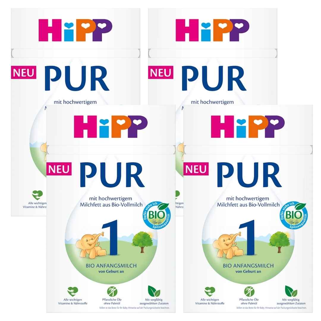 Four packages of HiPP PUR baby formula on a white background
