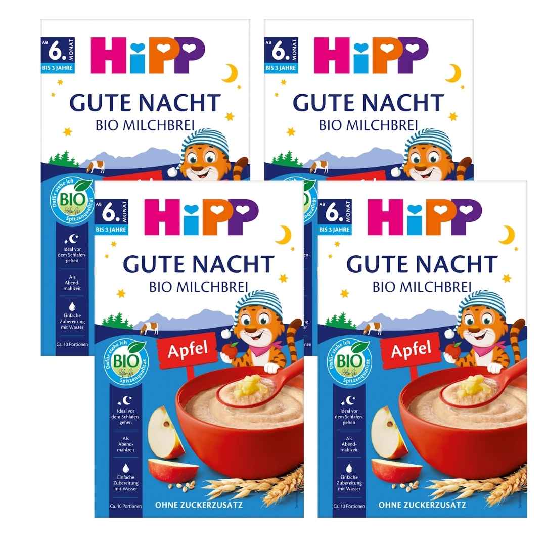 Three packages of HiPP Gute Nacht organic apple baby cereal on a white background