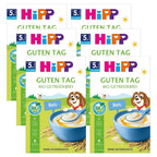 Multiple packages of HiPP cereal with colorful branding and a cartoon dog character.