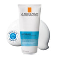 A 200 mL white tube of La Roche-Posay Anthelios Post-UV Exposure cream, shown on a white background with two white droplets behind it and a circular blue-and-white recommendation badge on the left.