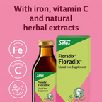 Salus Floradix Liquid Iron Supplement bottle and box on a pink background with text highlighting iron, vitamin C, and natural herbal extracts.