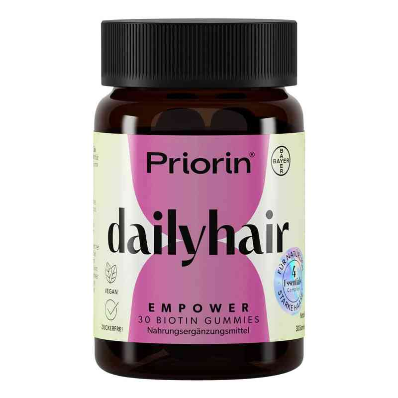 A bottle of Priorin Dailyhair biotin gummies, featuring a dark amber bottle with a black cap and a cream and pink label.
