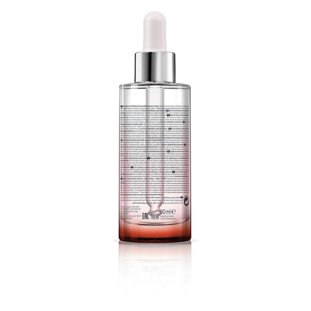 Back of the bottle of Kérastase Genesis Anti Hair Loss Fortifying Serum