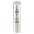 A bottle of Lubex Anti-Aging Vitamin C serum with a white and silver design, depicting the product as a depigmenting concentrate for skincare.